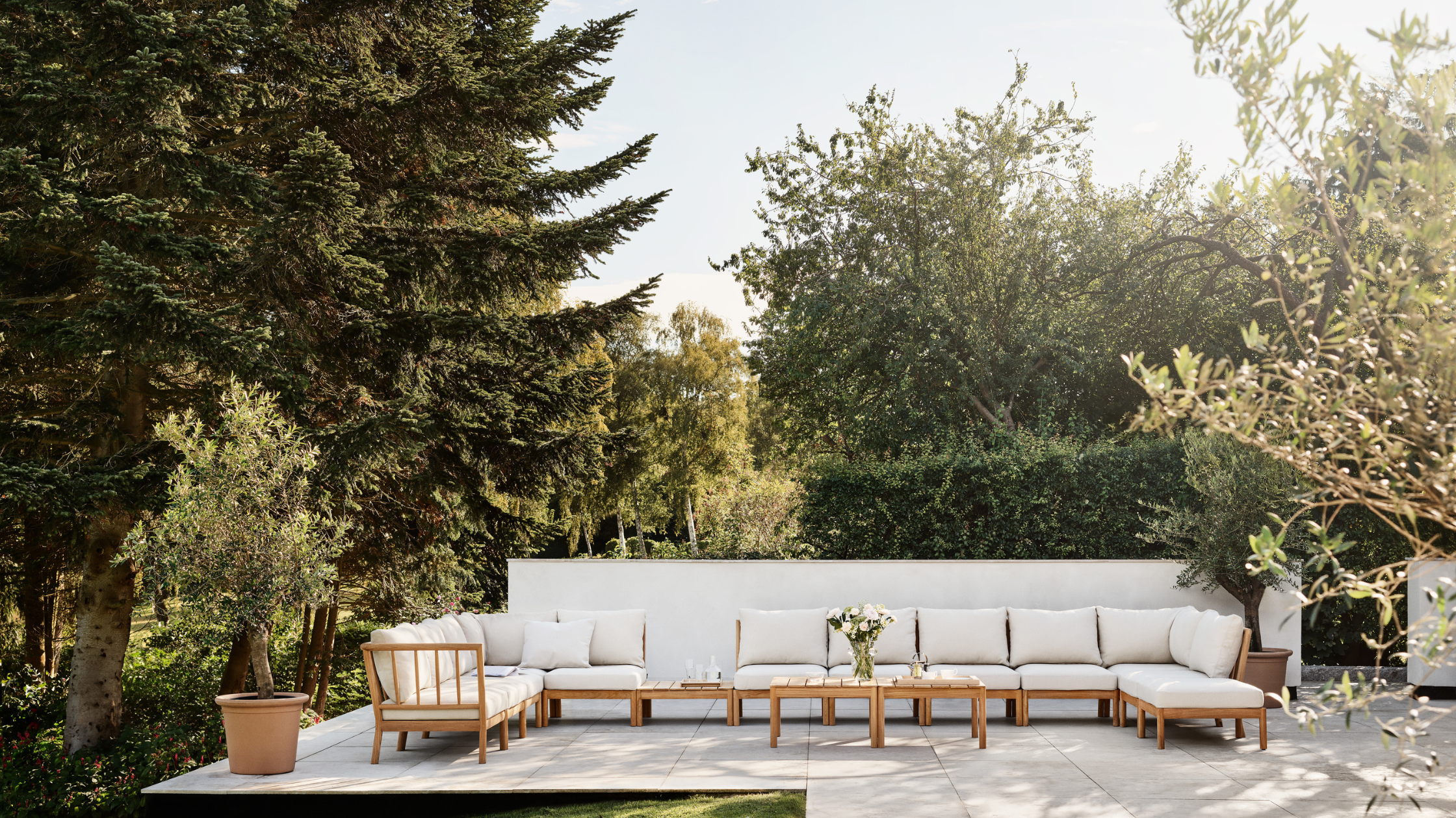 Nordic inspired outdoor retreat - context image of Fritz Hansen Tradition modular sofa