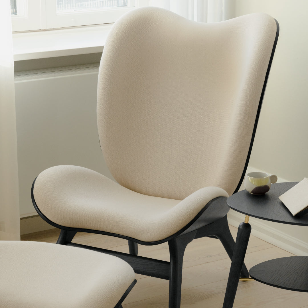 A Conversation Piece Tall Lounge Chair