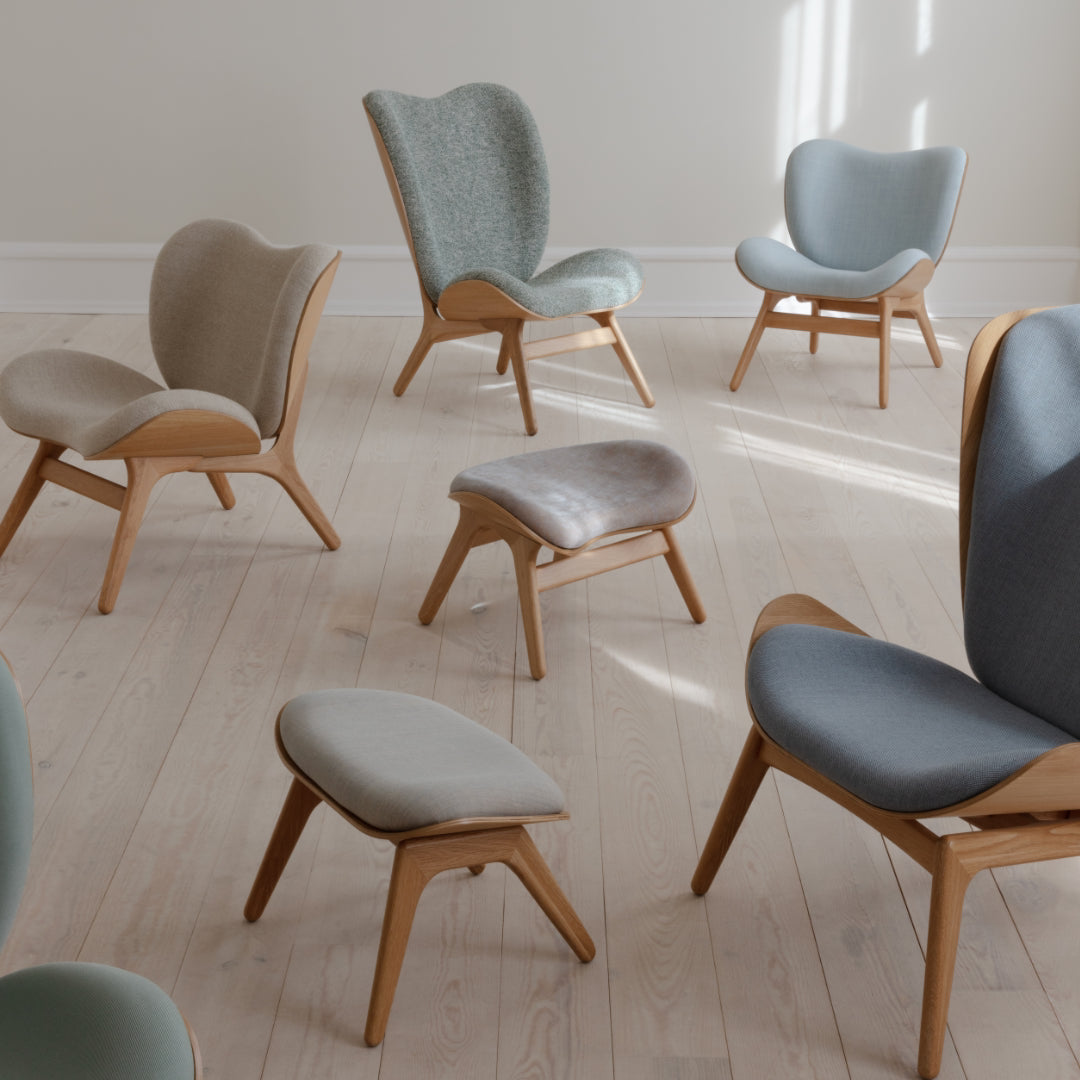 A Conversation Piece Tall Lounge Chair