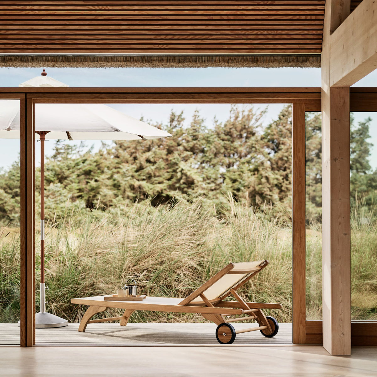 skagerak columbus sunbed on outdoor patio