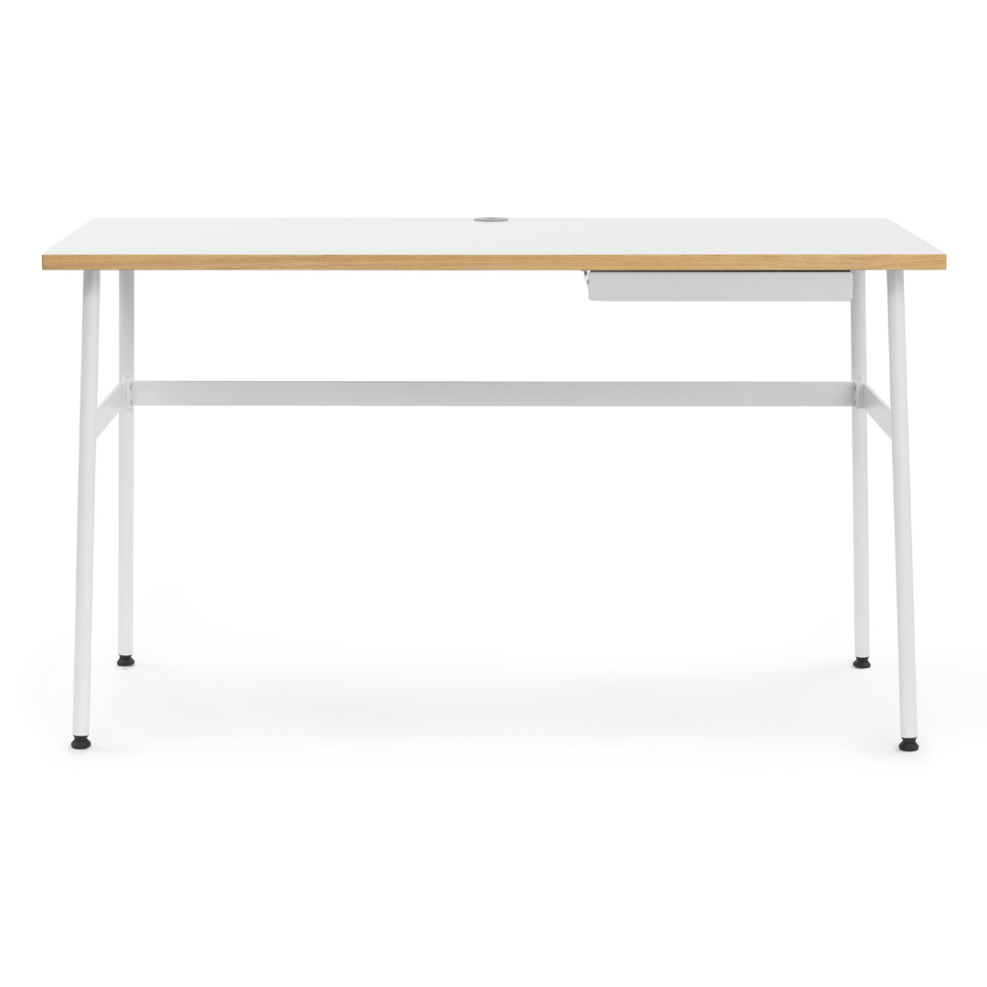 The Journal Desk by Normann Copenhagen celebrates simple and modern design that fits into any space throughout the home. This minimal desk offers all the essentials including a hole for power cords and a sleek steel drawer for daily-used office supplies.