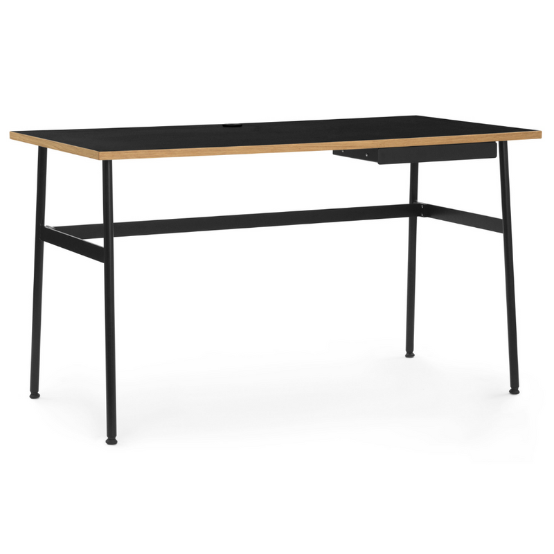The Journal Desk by Normann Copenhagen celebrates simple and modern design that fits into any space throughout the home. This minimal desk offers all the essentials including a hole for power cords and a sleek steel drawer for daily-used office supplies.