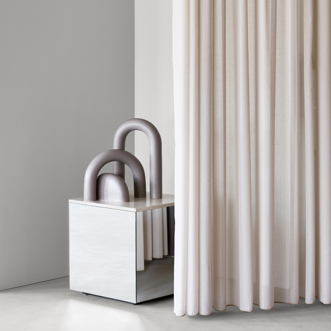 The Cupola Sculpture by Kristina Dam is a captivating and playful three-piece sculpture that is inspired by architectural shapes of arches and pillars. We love it's fluid shapes, and versatile uses. It's linear and smooth shape flows organically without rigidity and is intensely attractive when displayed in the modern and minimalistic home.