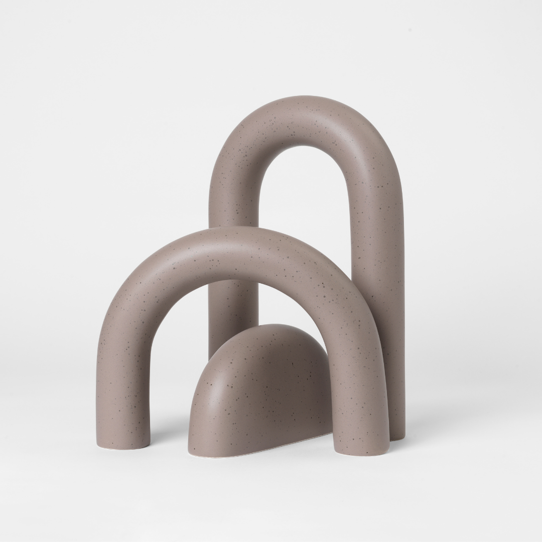 The Cupola Sculpture by Kristina Dam is a captivating and playful three-piece sculpture that is inspired by architectural shapes of arches and pillars. We love it's fluid shapes, and versatile uses. It's linear and smooth shape flows organically without rigidity and is intensely attractive when displayed in the modern and minimalistic home.