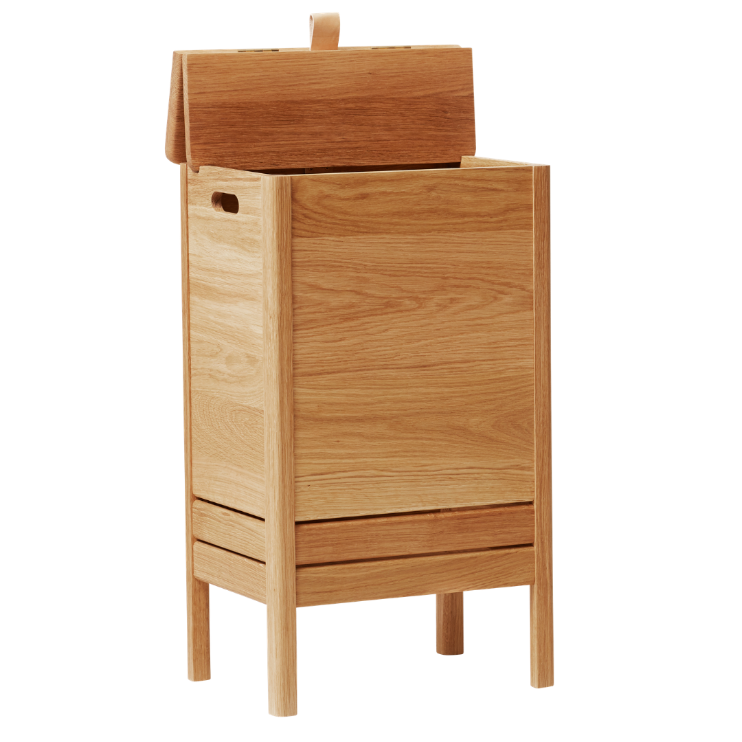 The A Line Laundry Box by Form and Refine is an aesthetically pleasing solution to the everyday challenge of disguising laundry. We love the thoughtful detail of the leather handle used to lift the lid of this storage piece, and how nicely it pairs with both the Natural and White Oak colourways.