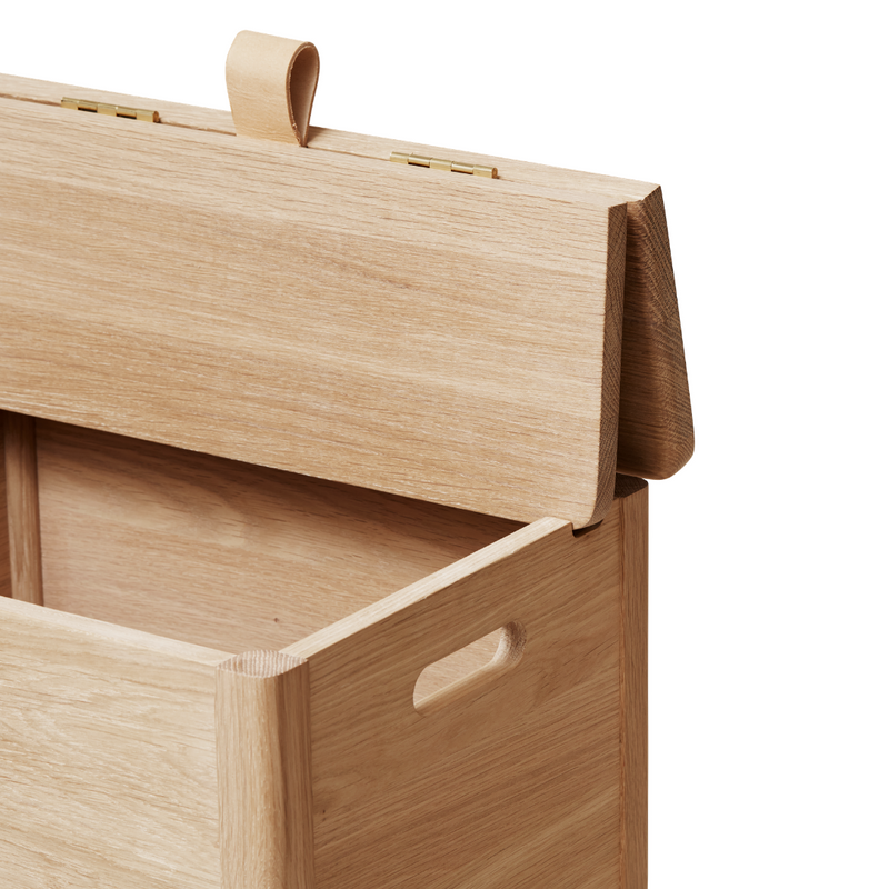 The A Line Laundry Box by Form and Refine is an aesthetically pleasing solution to the everyday challenge of disguising laundry. We love the thoughtful detail of the leather handle used to lift the lid of this storage piece, and how nicely it pairs with both the Natural and White Oak colourways.