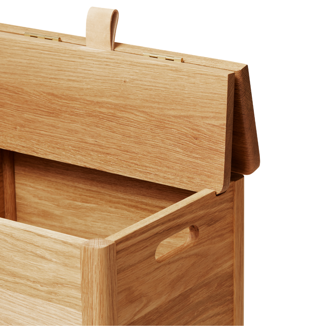 The A Line Laundry Box by Form and Refine is an aesthetically pleasing solution to the everyday challenge of disguising laundry. We love the thoughtful detail of the leather handle used to lift the lid of this storage piece, and how nicely it pairs with both the Natural and White Oak colourways.