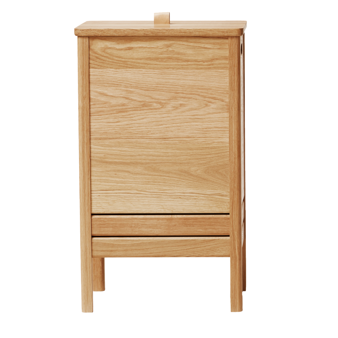 The A Line Laundry Box by Form and Refine is an aesthetically pleasing solution to the everyday challenge of disguising laundry. We love the thoughtful detail of the leather handle used to lift the lid of this storage piece, and how nicely it pairs with both the Natural and White Oak colourways.