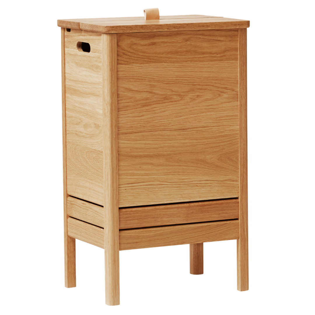 The A Line Laundry Box by Form and Refine is an aesthetically pleasing solution to the everyday challenge of disguising laundry. We love the thoughtful detail of the leather handle used to lift the lid of this storage piece, and how nicely it pairs with both the Natural and White Oak colourways.