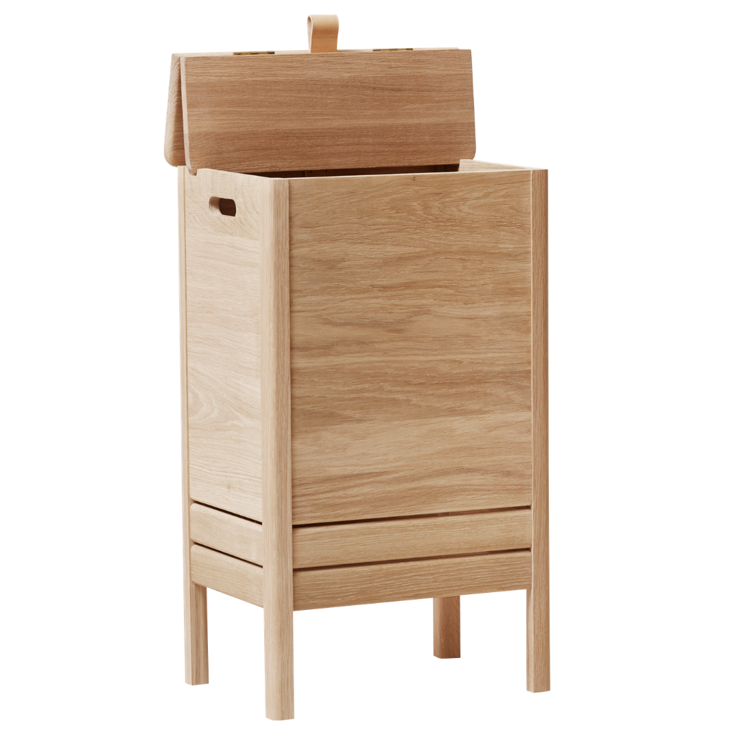 The A Line Laundry Box by Form and Refine is an aesthetically pleasing solution to the everyday challenge of disguising laundry. We love the thoughtful detail of the leather handle used to lift the lid of this storage piece, and how nicely it pairs with both the Natural and White Oak colourways.