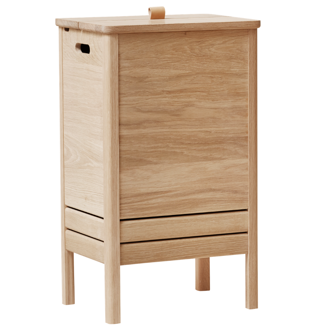 The A Line Laundry Box by Form and Refine is an aesthetically pleasing solution to the everyday challenge of disguising laundry. We love the thoughtful detail of the leather handle used to lift the lid of this storage piece, and how nicely it pairs with both the Natural and White Oak colourways.