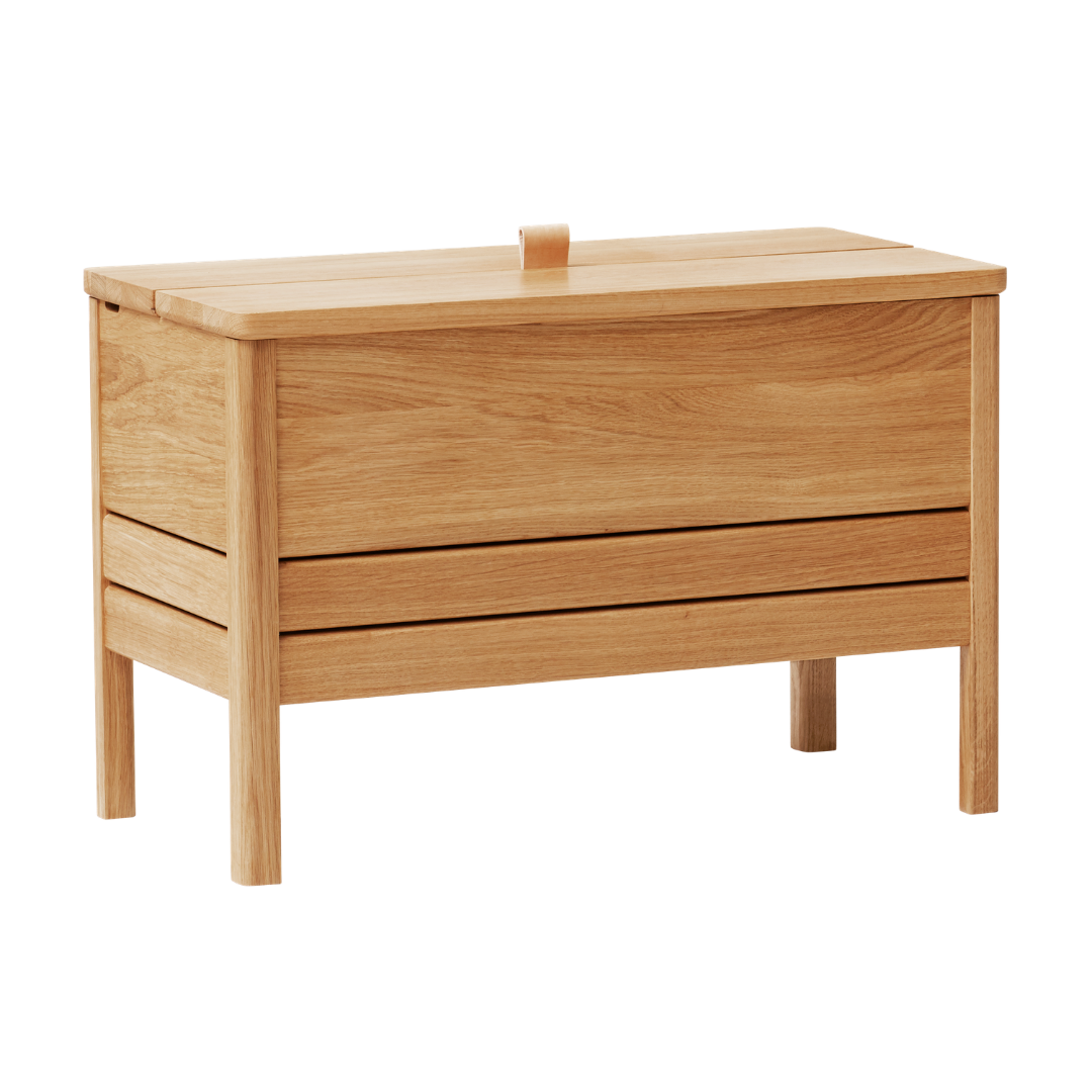 The A Line Storage Bench by Form and Refine is an updated and minimal storage bench with clean lines and solid wood construction, perfect for entryways and bedrooms.