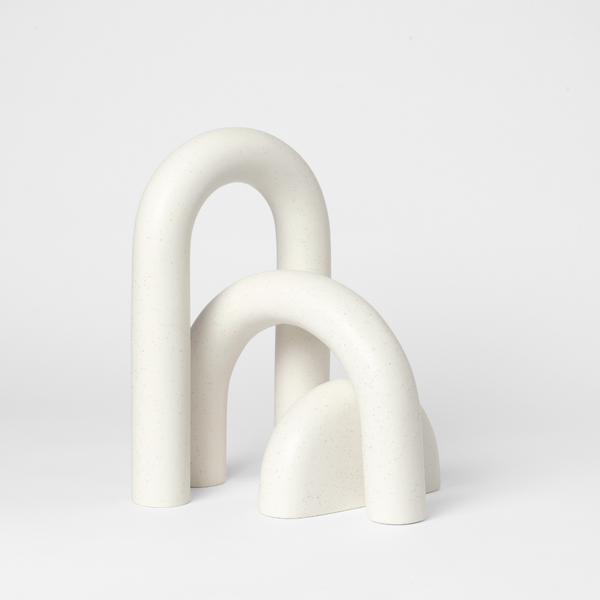 The Cupola Sculpture by Kristina Dam is a captivating and playful three-piece sculpture that is inspired by architectural shapes of arches and pillars. We love it's fluid shapes, and versatile uses. It's linear and smooth shape flows organically without rigidity and is intensely attractive when displayed in the modern and minimalistic home. 