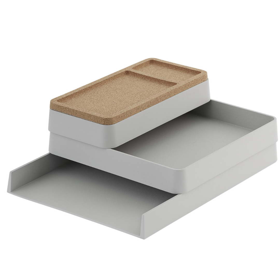 The Arrange Desktop Series is fun table top organizer that makes any workplace a little more fun. The trays are made from 100% recycled plastic and paired with lids of anodized aluminum for the Multi color configuration or cork when ordered in Grey.