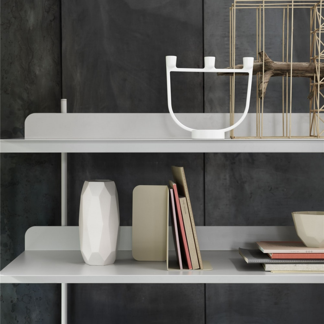 The Open Candelabra was created by MUUTO in collaboration with Jens Fager as a simple but aesthetically pleasing addition anywhere in the styled home. The Open Candelabra is created using powder coated aluminum alloy, which is casted then assembled by hand. We love this styled as a centerpiece on the dining table, but it's also a stunning piece for an entryway credenza or console. It's also the perfect gift for your favorite gathering host.