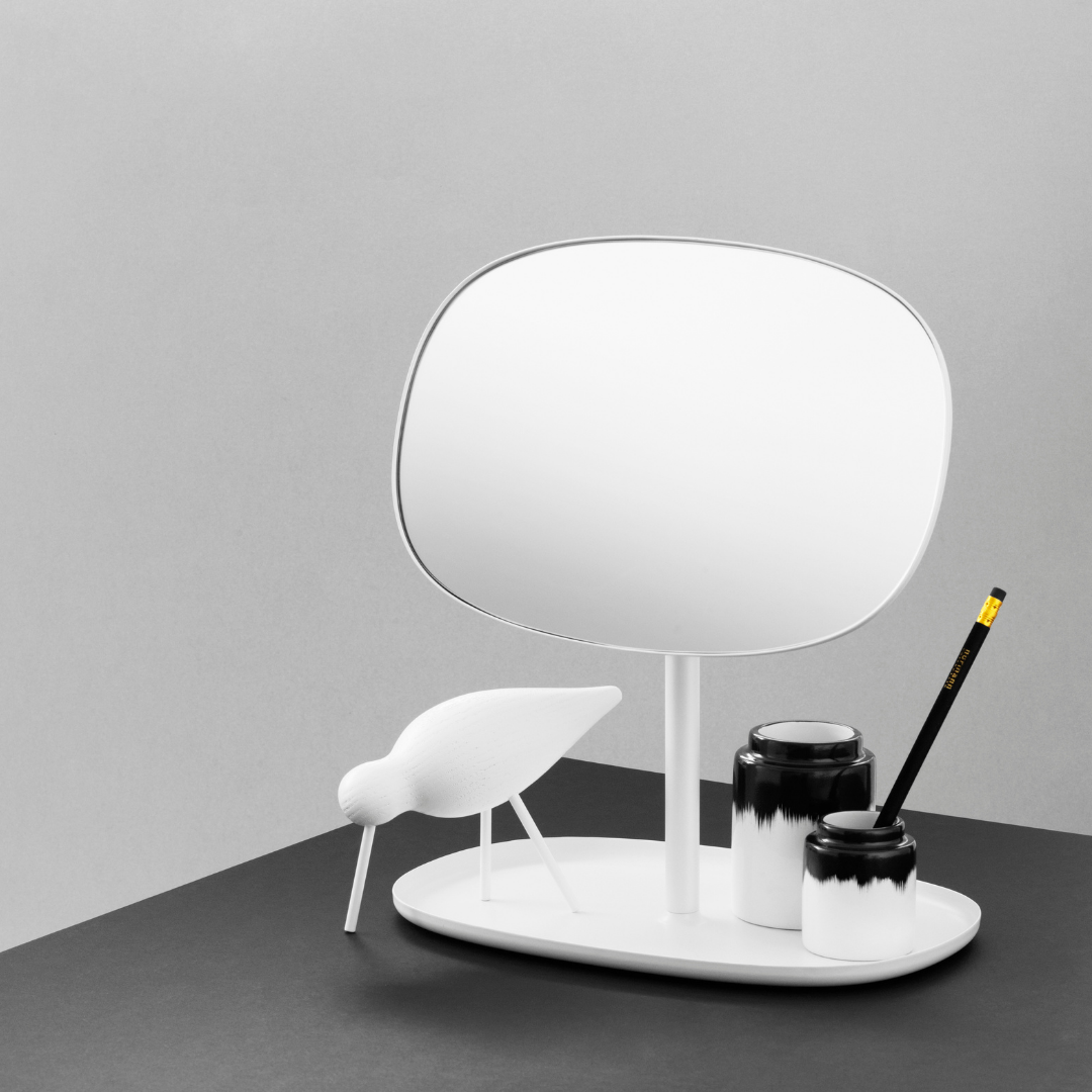 The Flip Mirror by Normann Copenhagen was created in collaboration with Javier Moreno Studio as a beautifully simplistic table mirror that can be rotated 360 degrees. We appreciate the organic shape the mirror takes on, which is amplified by the easy flow of movement expressed when turning the mirror as needed.