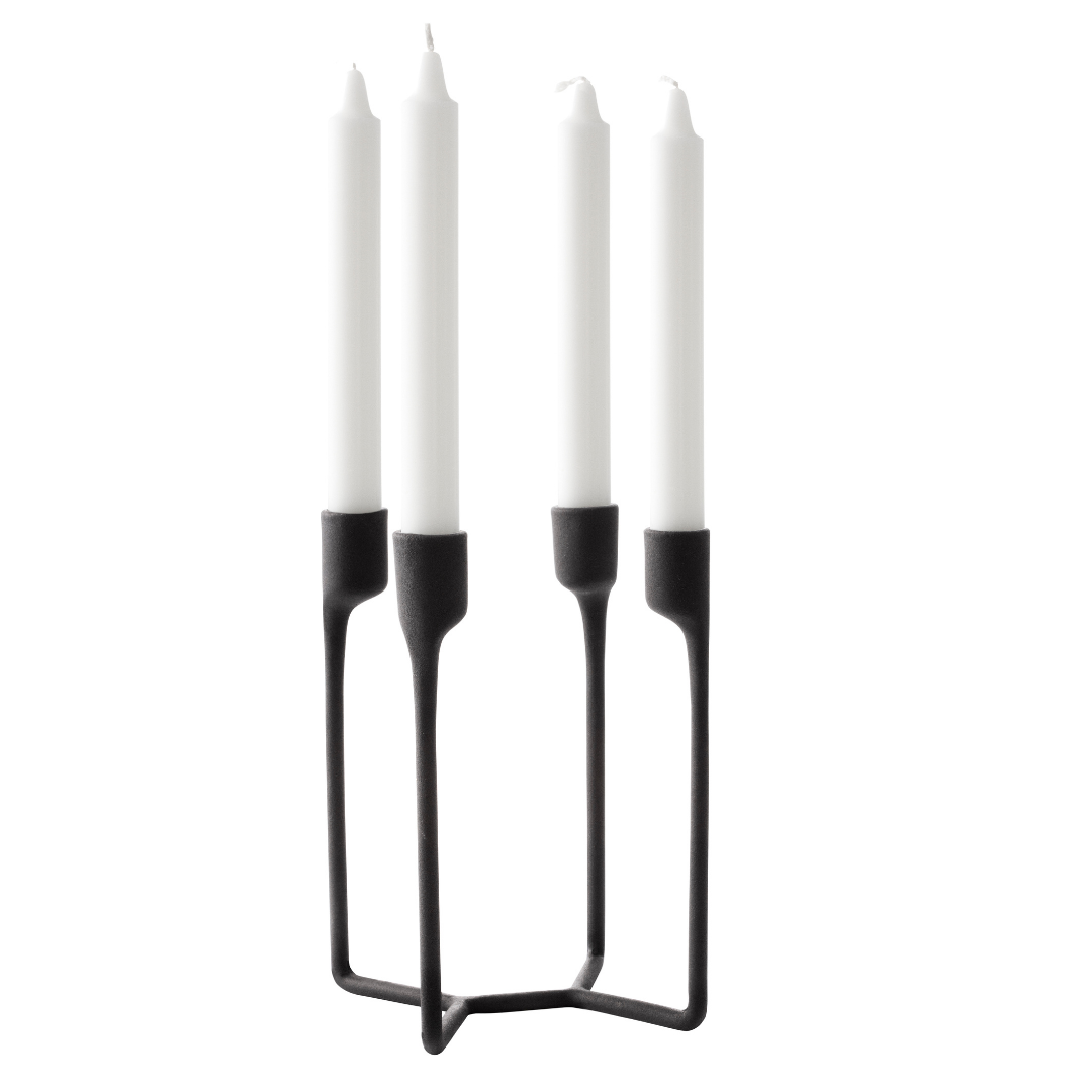The Normann Copenhagen Heima 4-armed Candlestick in Black is the perfect addition to a well-styled home. We love it styled as a dining room centerpiece or on an entryway table. Paying homage to industrial, Nordic design - the Heima is sculptural yet minimalistic. The Heima is special enough for celebrations but simple and stylish enough for everyday use. Made of cast iron, this decor piece is made to last and will be one of your favorite candle holders.