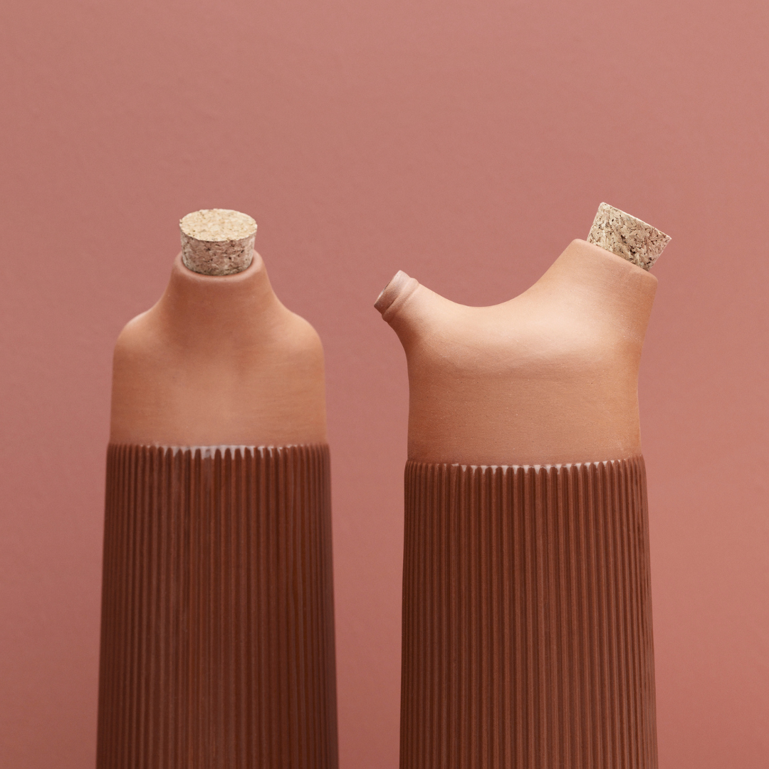 The Junto Carafe by Normann Copenhagen was inspired by traditional Spanish ceramics in a beautiful fired terracotta. We love the organic shape of the handmade stoneware, which creates the perfect spout for pouring water or juice from the carafe.