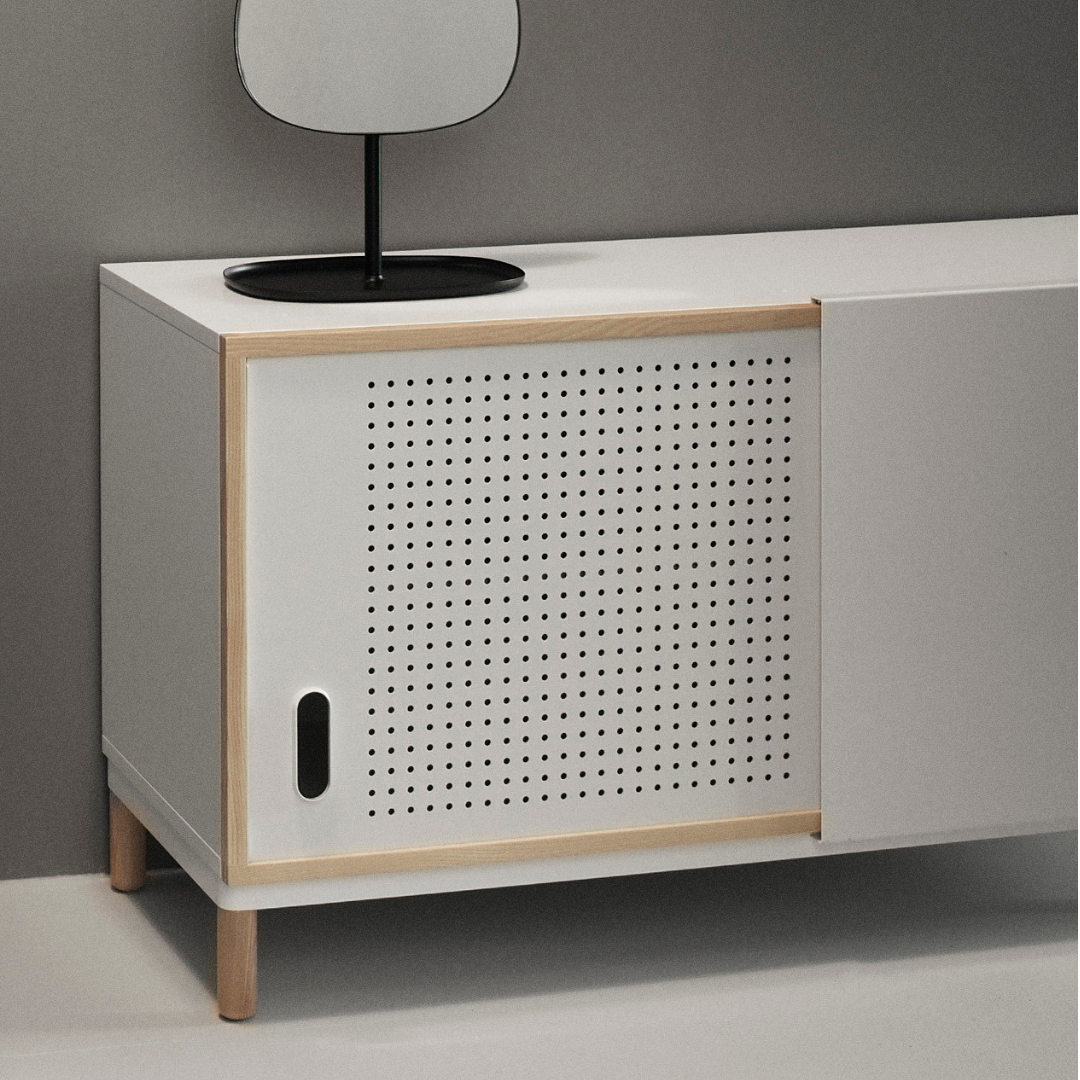 The Kabino Sideboard by Normann Copenhagen was designed by Simon Legald as a simple yet stylish storage solution that has careful details added in for a unique look. We love it styled as an entryway credenza, styled with a table top lamp, a stack of books or a collection of vases. Its neutral and modern style allows it to blend in or stand out depending on its intended use.