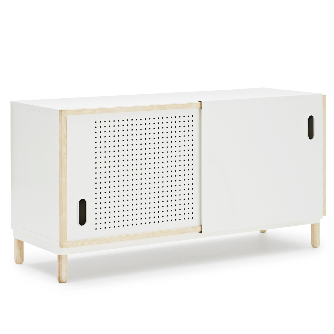 The Kabino Sideboard by Normann Copenhagen was designed by Simon Legald as a simple yet stylish storage solution that has careful details added in for a unique look. We love it styled as an entryway credenza, styled with a table top lamp, a stack of books or a collection of vases. Its neutral and modern style allows it to blend in or stand out depending on its intended use.