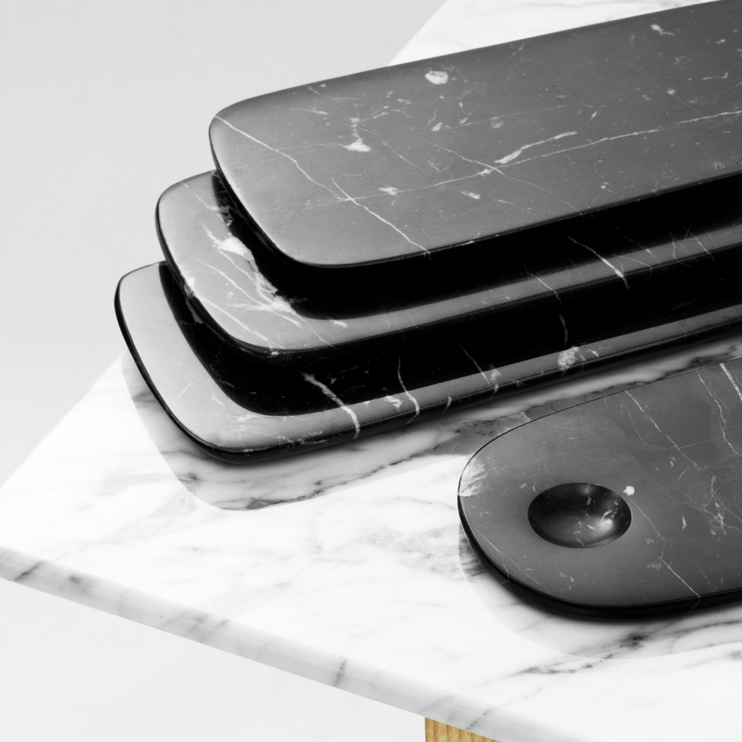 The Pebble Board in Small by Normann Copenhagen is the perfect addition to any home's kitchen decor. Made from a beautiful black marble with white and grey veining, the Pebble Board is a great way to serve up a selection of cheeses and other charcuterie, and it looks beautiful when styled with your most loved breakfast fruits and baked goods.