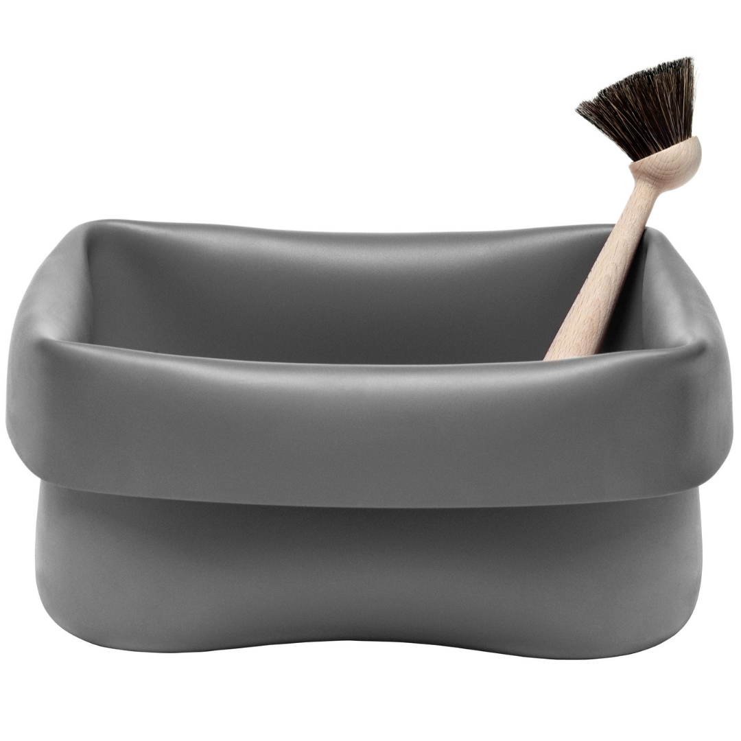 The Washing-up Bowl & Brush set by Normann Copenhagen is a fun and unique storage solution that can be used in a variety of places throughout the home. The Washing-up Bowl is made of a rubber material, making it perfect for use in the kitchen or bathroom, but its durability is also suitable for holding your favorite plant, storing toys or chilling down your favorite beverages. We love that this item is portable and easy to care for.