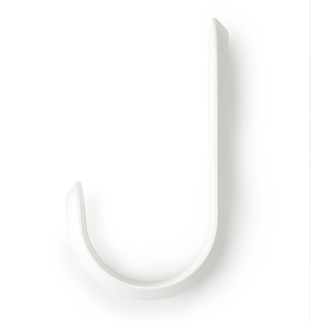 The Curve Hook by Normann Copenhagen was designed in collaboration with Danish designer Peter Johansen as a modern take on the classic hook often found in the entryway of the home.