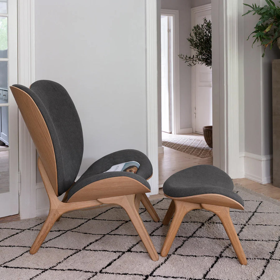 A Conversation Piece Tall Lounge Chair