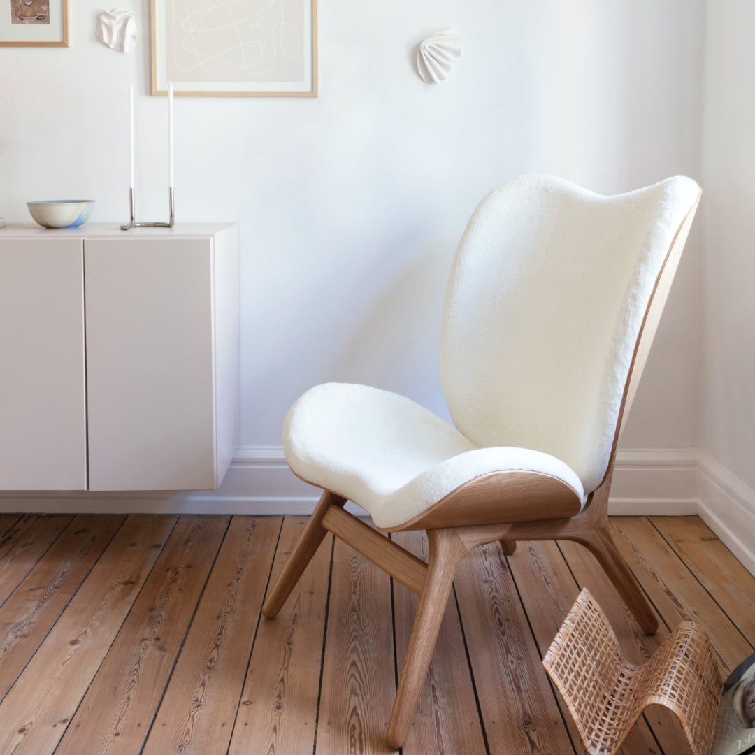 A Conversation Piece Tall Lounge Chair