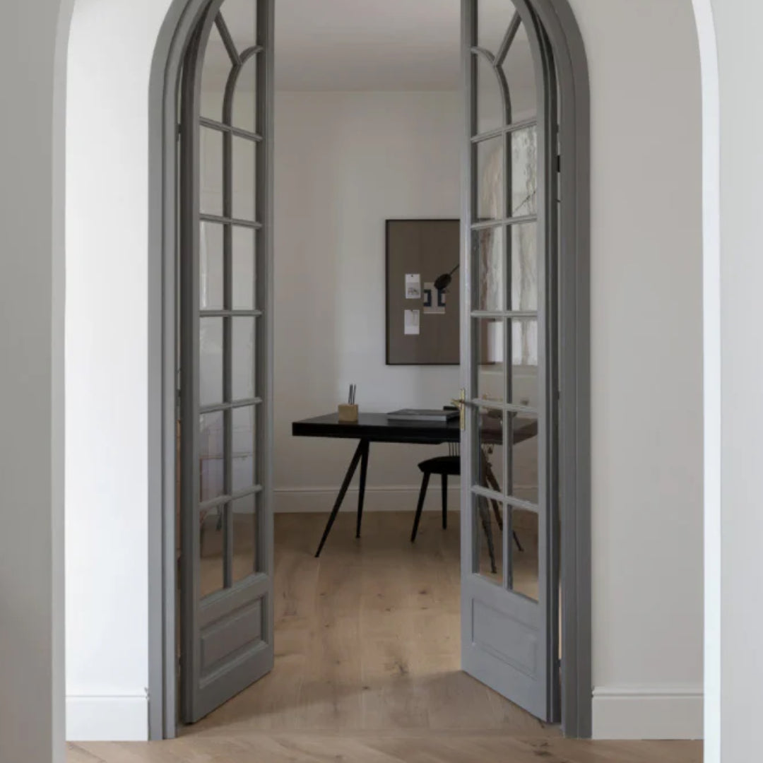 Open door leading to a room with the NORR11 JFK Office Desk