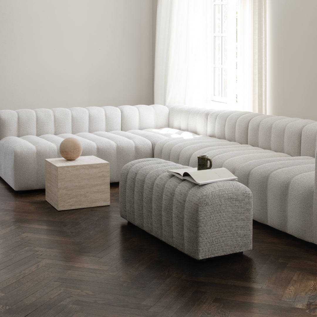 Studio Bench used as coffee table in living room lifestyle shot