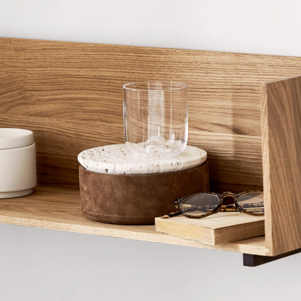 The Suede Box by Kristina Dam is a special container for any space of your home that needs a luxe upgrade for small storage. Made from suede and travertine - this small container is perfect for the bathroom, bedroom or home office - as it perfectly holds jewelry, paper clips or cotton swabs in a well-styled manner.