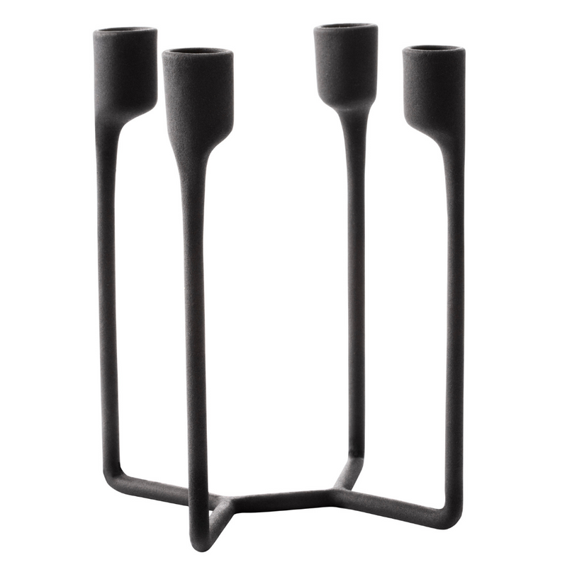 The Normann Copenhagen Heima 4-armed Candlestick in Black is the perfect addition to a well-styled home. We love it styled as a dining room centerpiece or on an entryway table. Paying homage to industrial, Nordic design - the Heima is sculptural yet minimalistic.  The Heima is special enough for celebrations but simple and stylish enough for everyday use. Made of cast iron, this decor piece is made to last and will be one of your favorite candle holders.