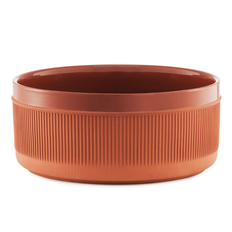 The Junto Bowl by Normann Copenhagen was inspired by traditional Spanish ceramics in a beautiful fired terracotta. We love the organic shape of the handmade stoneware, and the Junto Bowl is the perfect addition to a modern counter top or dining table.