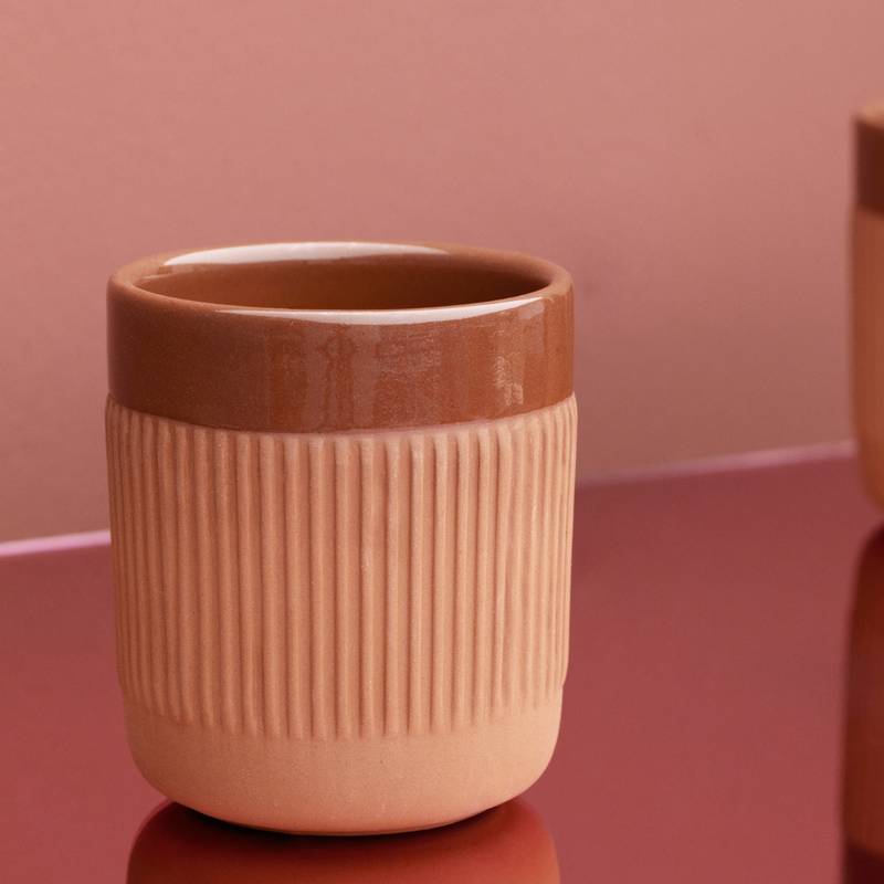The Junto Cup by Normann Copenhagen was inspired by traditional Spanish ceramics in a beautiful fired terracotta. We love the organic shape of the handmade stoneware, and the Junto Cup is the perfect compliment to the Junto Carafe.