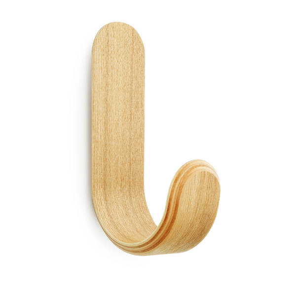 The Curve Hook by Normann Copenhagen was designed in collaboration with Danish designer Peter Johansen as a modern take on the classic hook often found in the entryway of the home.